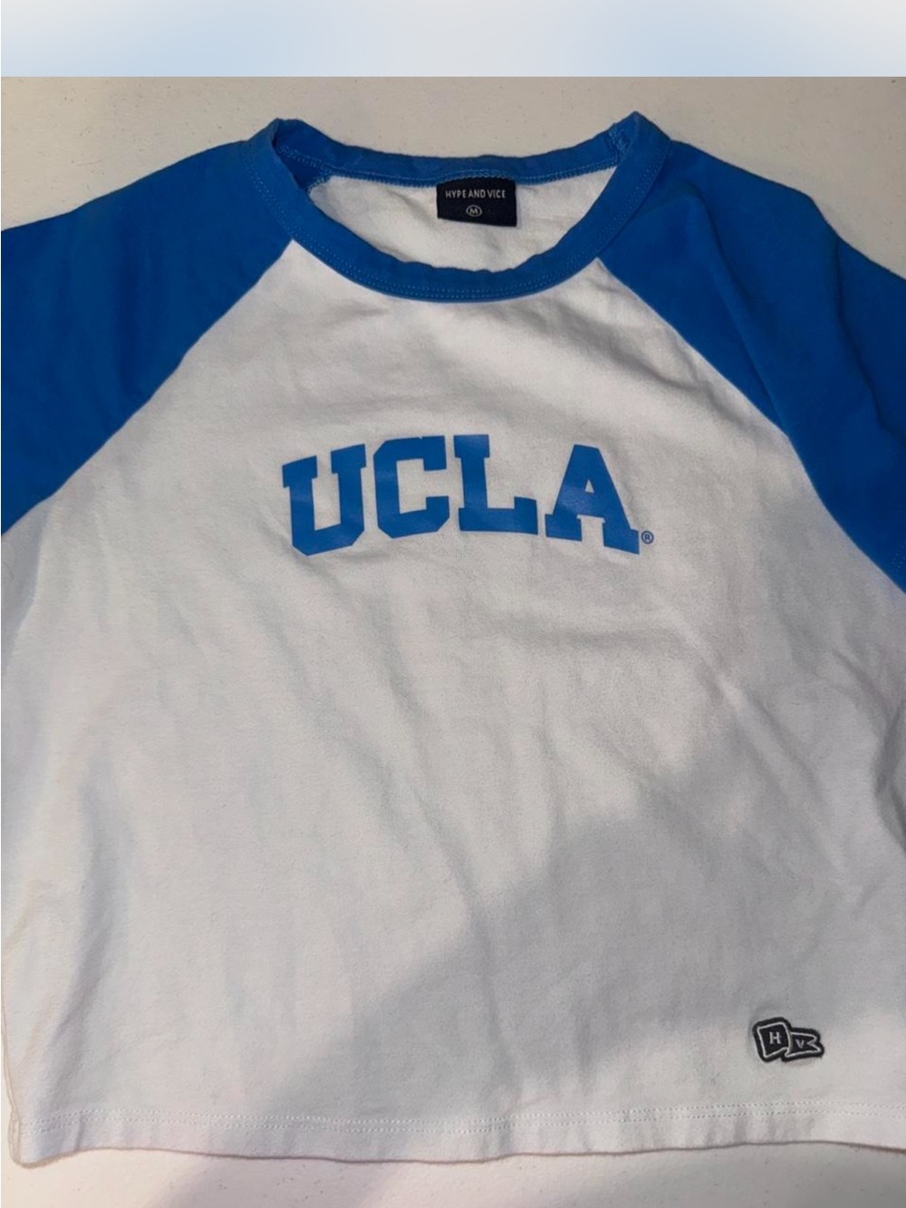 UCLA Blue & White Raglan Crop Top by Hype and Vice